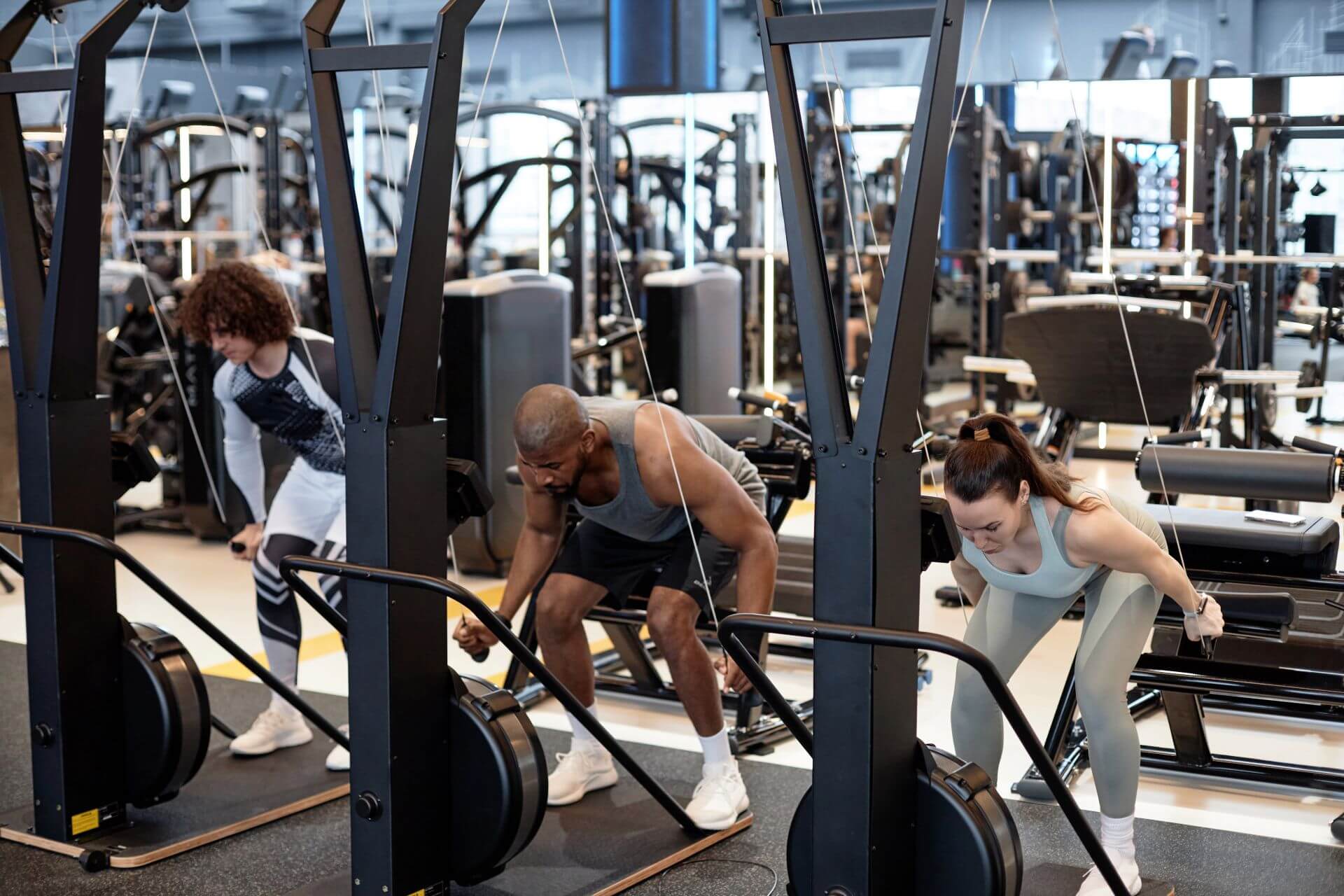 people using exercise machines in gym 2024 05 21 22 28 13 utc
